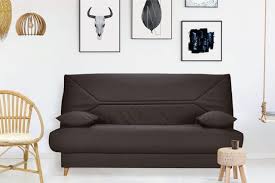 Canapé lit clic-clac 2 personnes noir dans un salon blanc