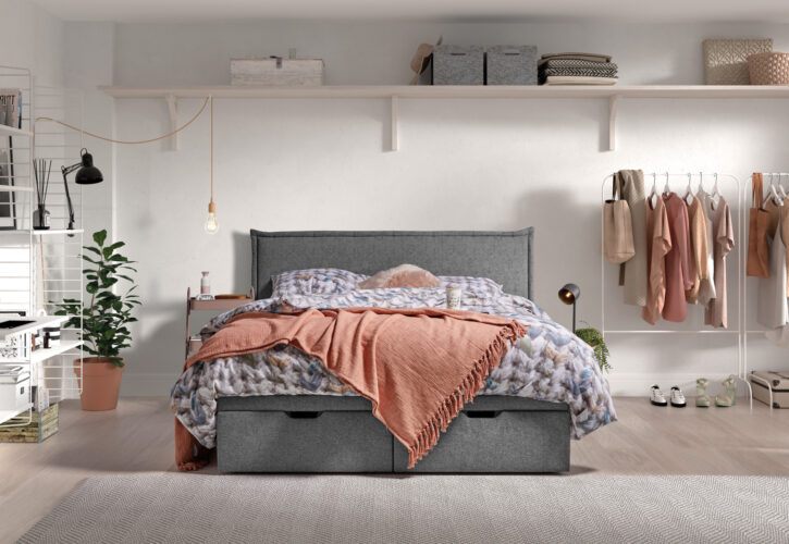 BOXSPRING à rangement dans une chambre de couleur gris