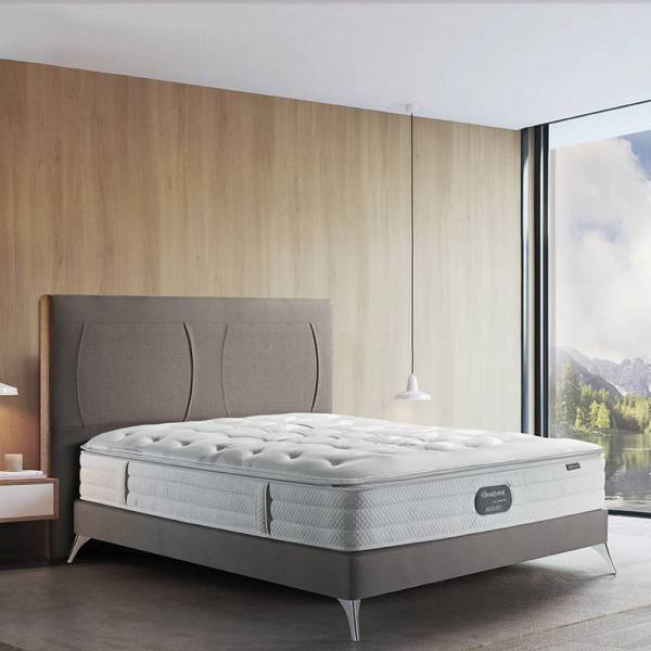 MATELAS BEAUTYREST RESTORT LAKE 160x200 gris dans une chambre